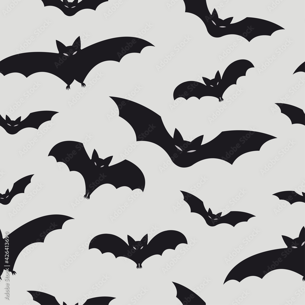 Fototapeta premium Halloween seamless patterns with flying bats. Vector illustration. Bat silhouettes isolated on grey background.