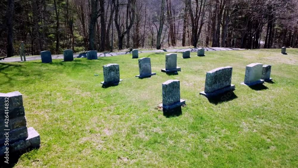 Slow aerial pull tombstones in north carolina graveyard Slow aerial pull tombstones in north carolina graveyard