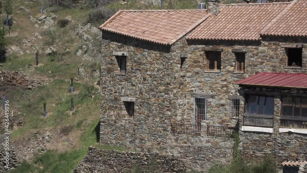 Close up shoot of a house in an ancient medieval village made with rocks in Madrid, Spain Close up shoot of a house in an ancient medieval village made with rocks in Madrid, Spain