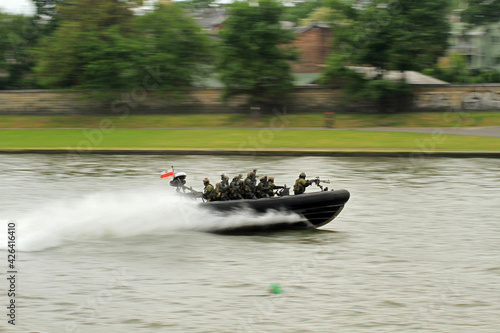 Special forces boat on the river in action