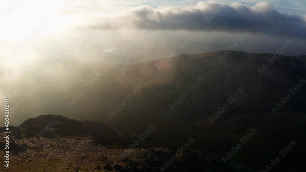 Mountains on foggy day with cloudy sky Mountains on foggy day with cloudy sky