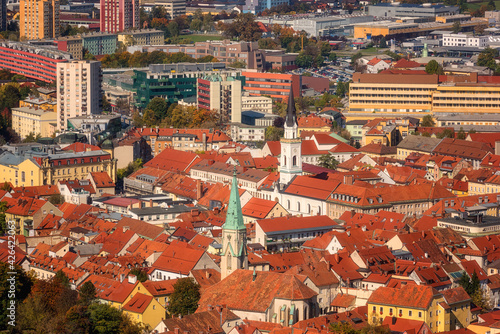 Aerial view of the historic center of Celje city with belfries and red tiled roofs, scenic cityscape, Slovenia, Styria. Outdoor travel background