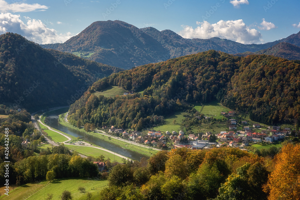 Scenic view of the Lasko valley, Celje countryside and beautiful Alps mountains from Celje castle (Celjski Stari grad), amazing autumn landscape, Slovenia, Styria. Outdoor travel background Scenic view of the Lasko valley, Celje countryside and beautiful Alps mountains from Celje castle (Celjski Stari grad), amazing autumn landscape, Slovenia, Styria. Outdoor travel background