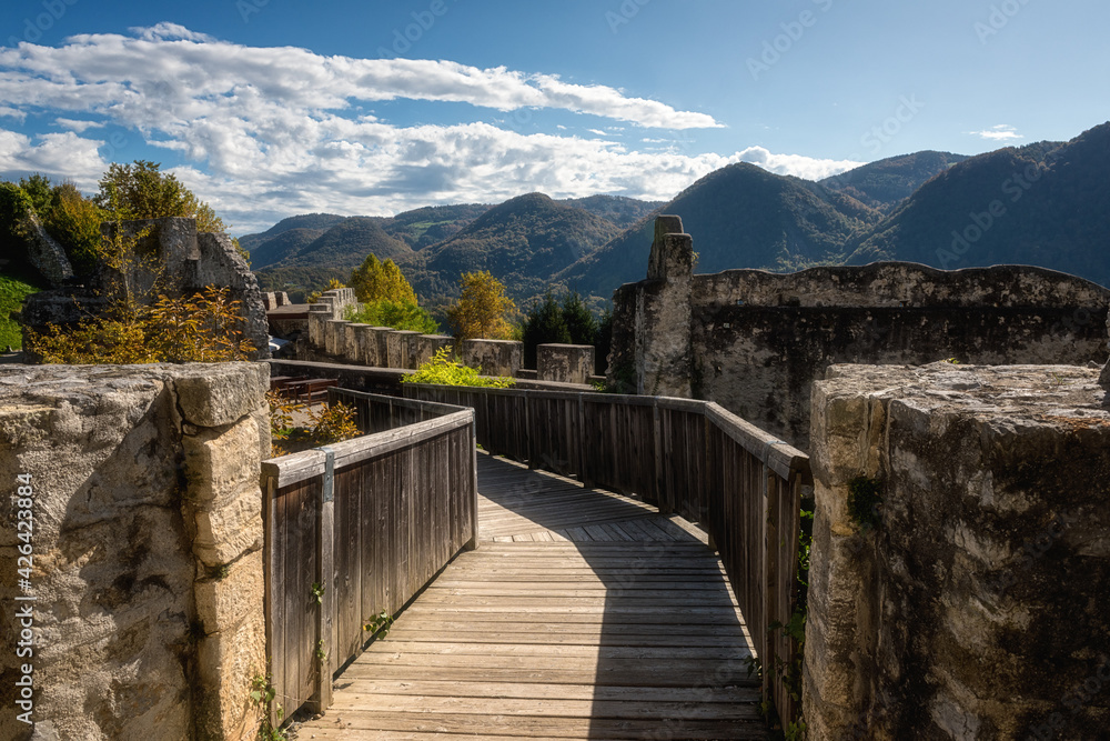 Tourist route on the wooden floor in Celje Old castle (Celjski Stari grad), stunning medieval fortification in Lasko valley in Julian Alps mountains, Celje, Slovenia, Styria. Outdoor travel background Tourist route on the wooden floor in Celje Old castle (Celjski Stari grad), stunning medieval fortification in Lasko valley in Julian Alps mountains, Celje, Slovenia, Styria. Outdoor travel background