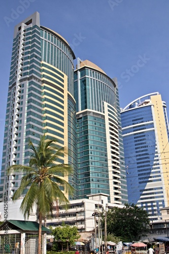 View of a tall modern building in the center of Dar es Salaam city. Tanzania. Africa.