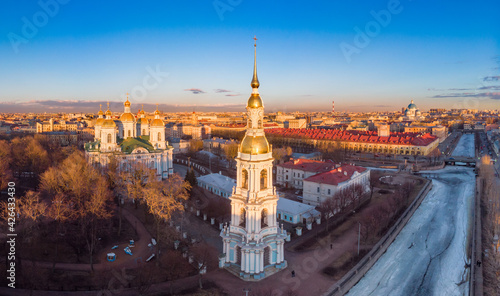 Aerial top view to St. Nicholas Naval Sea Cathedral in sunny day. Panorama of evening historical city center. Orthodox church located on banks of Kryukov and Griboyedov canal. Saint Petersburg. Russia © Alex Shirmanov