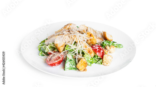 Caesar salad isolated on a white background.