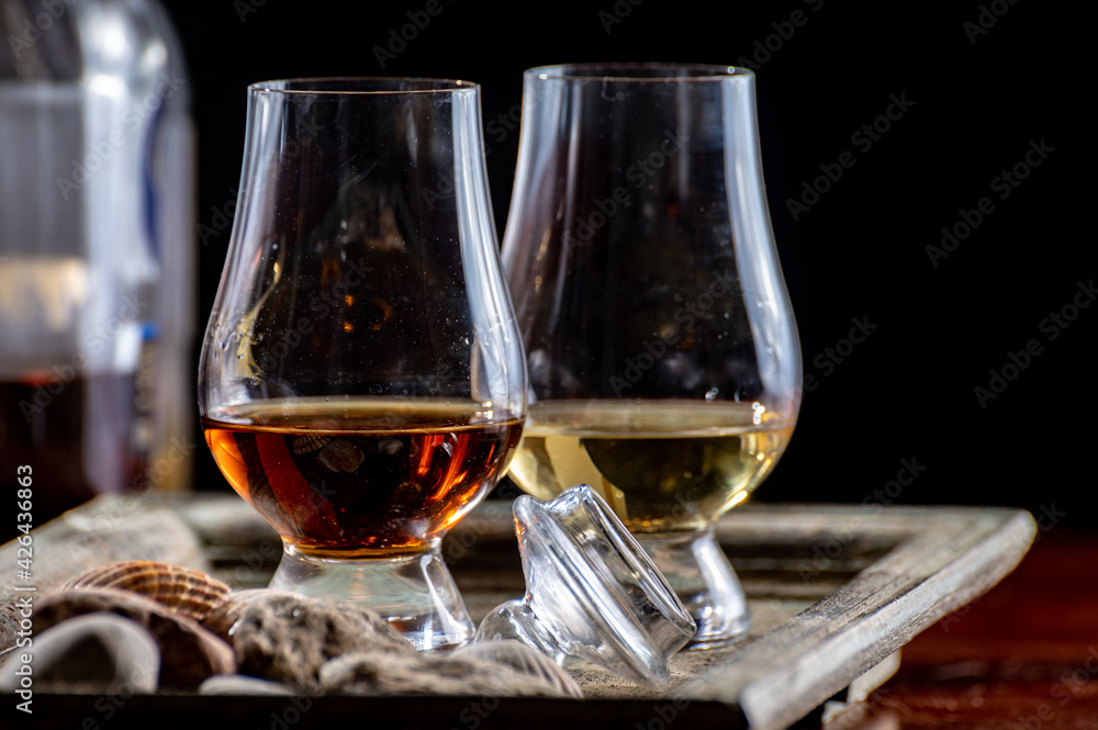 Glasses of scotch whisky served in bar in Edinburgh, Scotland, UK Glasses of scotch whisky served in bar in Edinburgh, Scotland, UK
