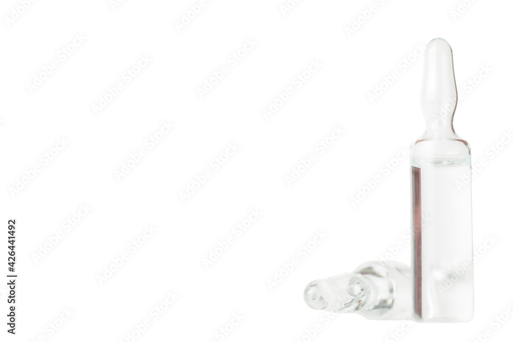 two ampoules with transparent vaccine isolated on white background with place for text two ampoules with transparent vaccine isolated on white background with place for text