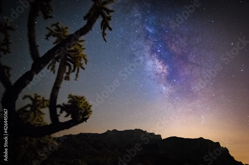 Milky way rising over the Superstitions mountains Arizona. Noisy due to high ISO. 
