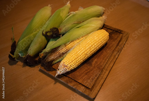 Fresh tender yellow corn on the cob photo