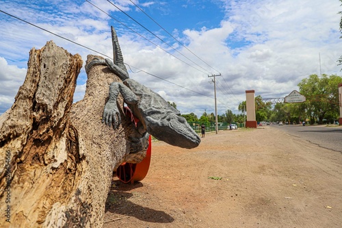 Sculptures of giant iguanas at the entrance to the town , one of the Yaquis communities in  Mexico. town of iguanas.  photo