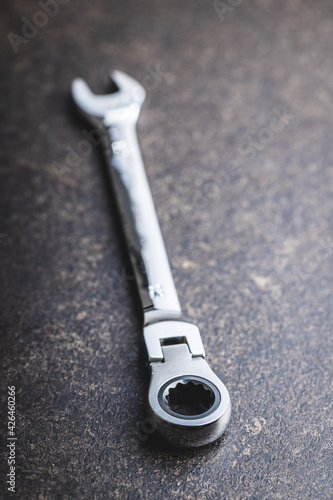 Stainless steel ratchet wrench. photo