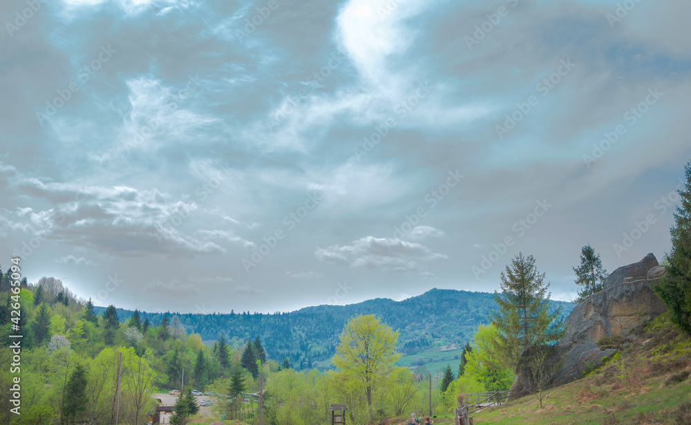 Landscape in the Carpathians against the background of an extraordinary sky