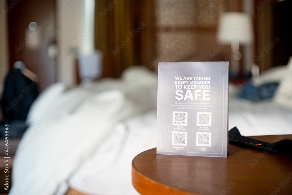 shallow depth of field shot showing coronavirus covid19 guidelines using QR code for contactless menu, room service, travel guide and more shallow depth of field shot showing coronavirus covid19 guidelines using QR code for contactless menu, room service, travel guide and more