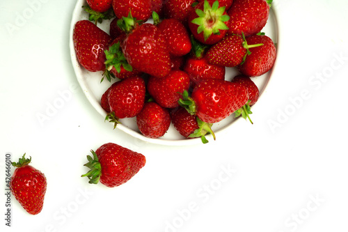 Ripe red strawberries in a bowl