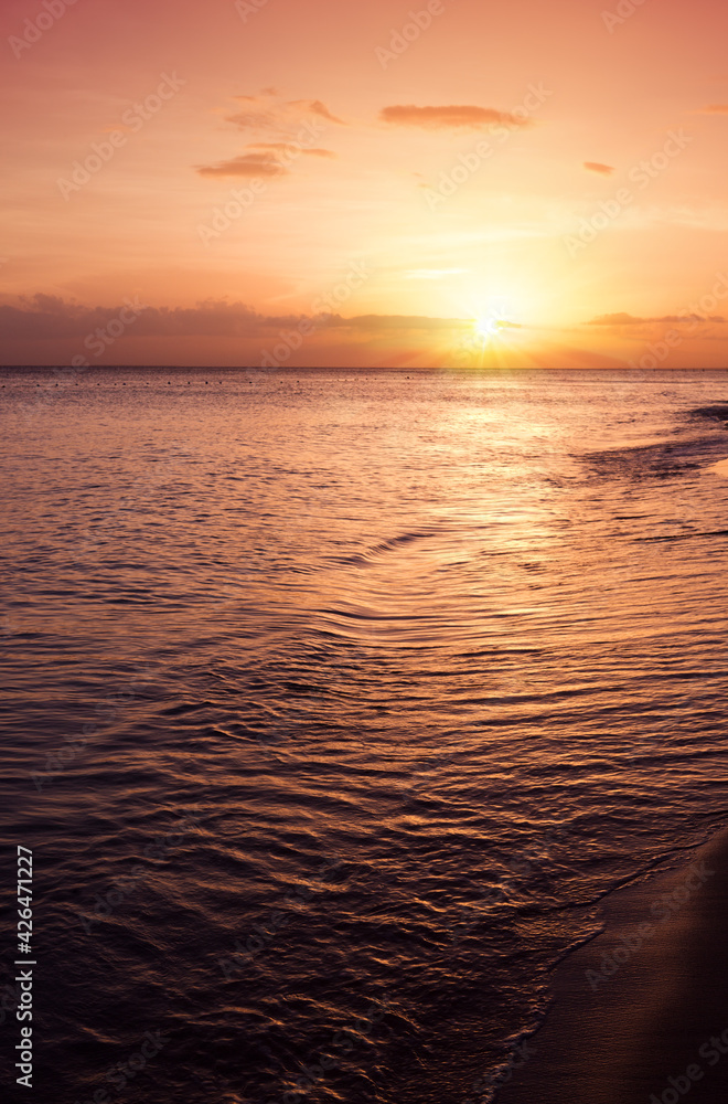 Obraz premium Sunset on the beach of caribbean sea.Summer background.