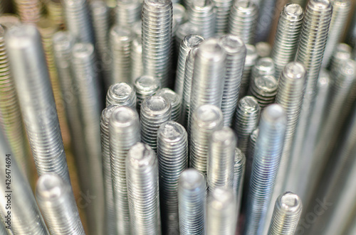 Long threaded rods (galvanized) for construction.