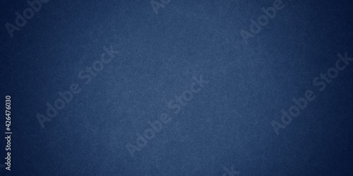 Texture of old navy grunge blue paper closeup background