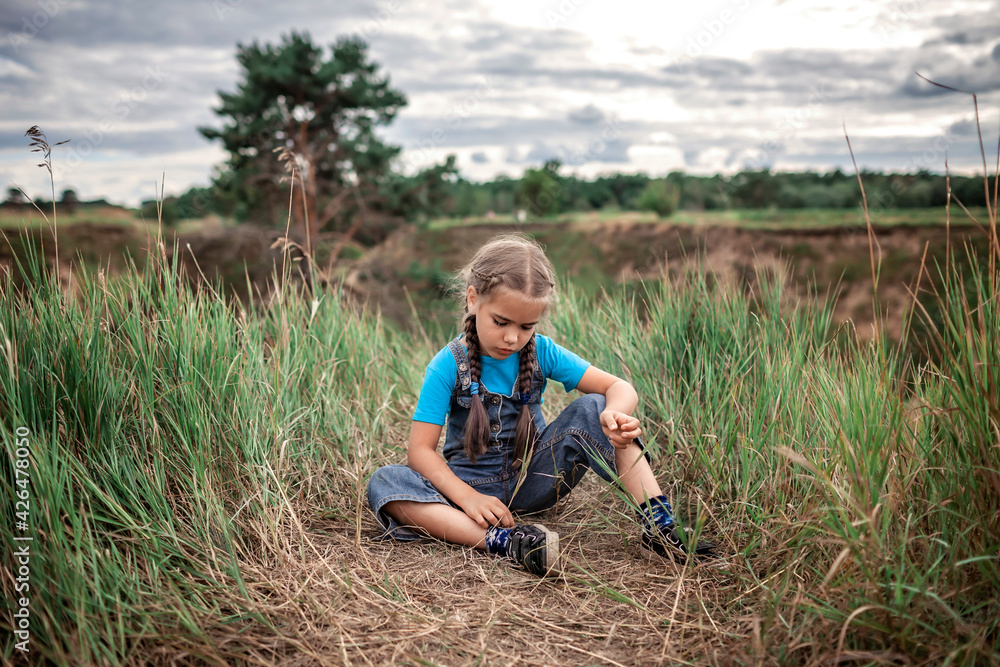 Happy girl relaxing away on nature, digital detox, escape and getaway, calm summertime, lifestyle outdoors, local travel and vacation Happy girl relaxing away on nature, digital detox, escape and getaway, calm summertime, lifestyle outdoors, local travel and vacation