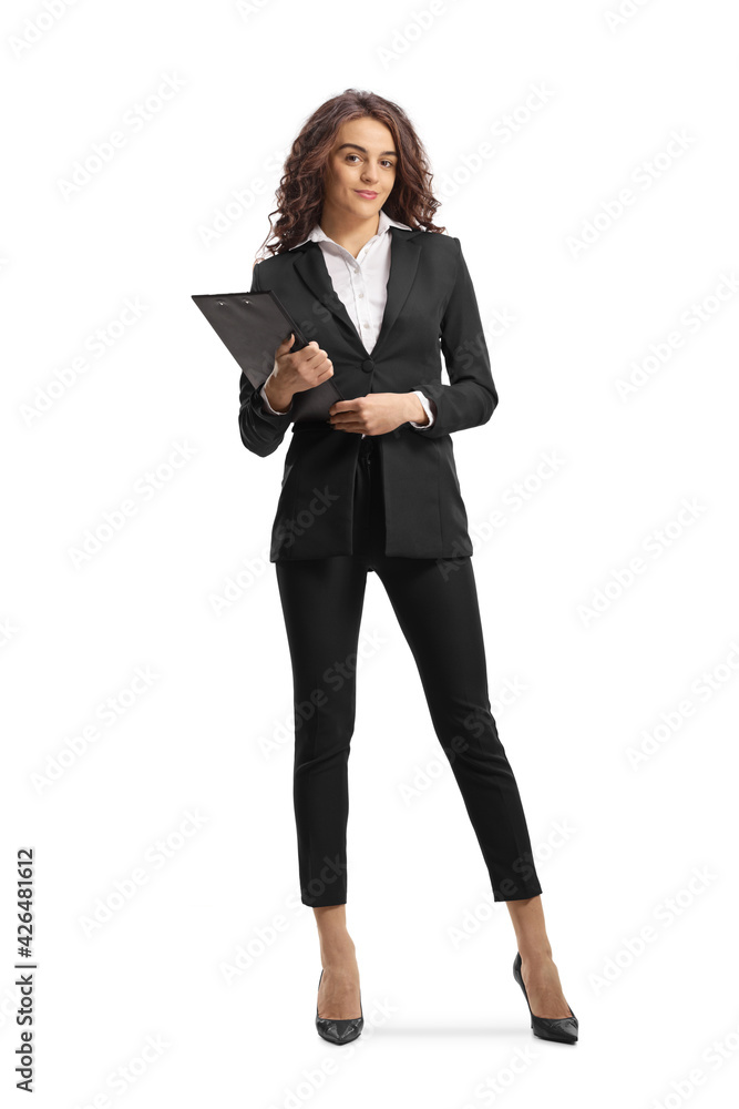 Full length portrait of a young businesswoman holding a clipboard and posing Full length portrait of a young businesswoman holding a clipboard and posing