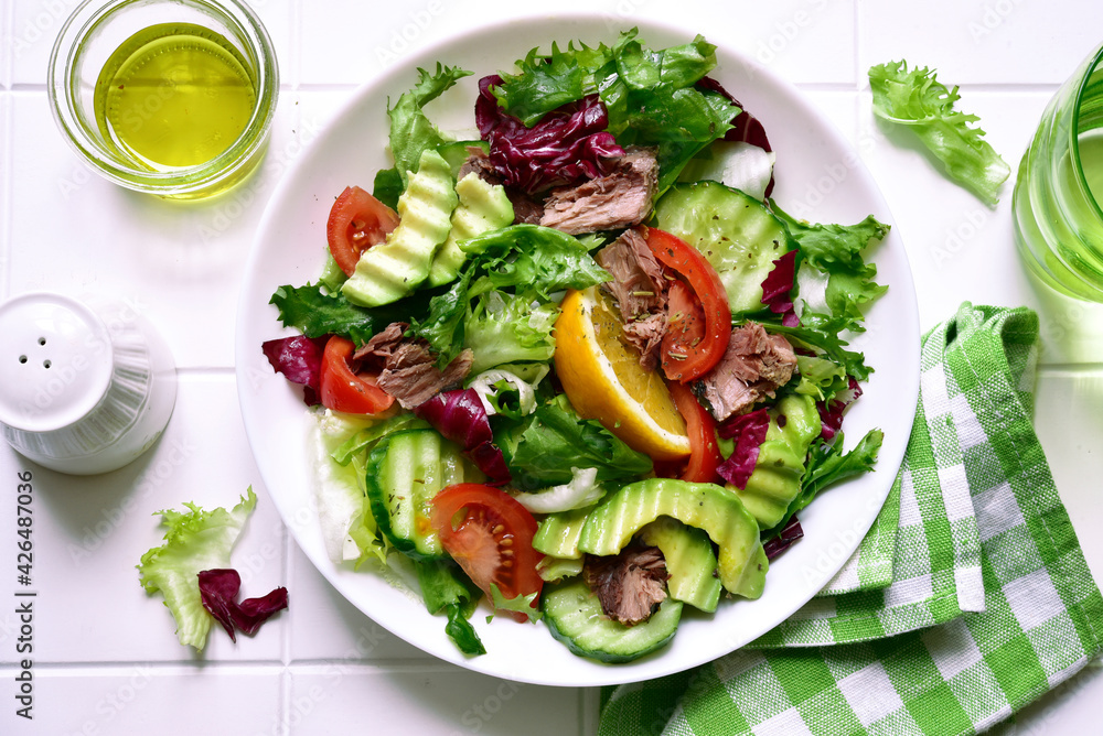 Tuna salad with fresh vegetables . Top view with copy space.