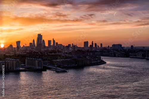 Wide panoramic view to the skyline of London along the river Thames  United Kingdom  during sunset time