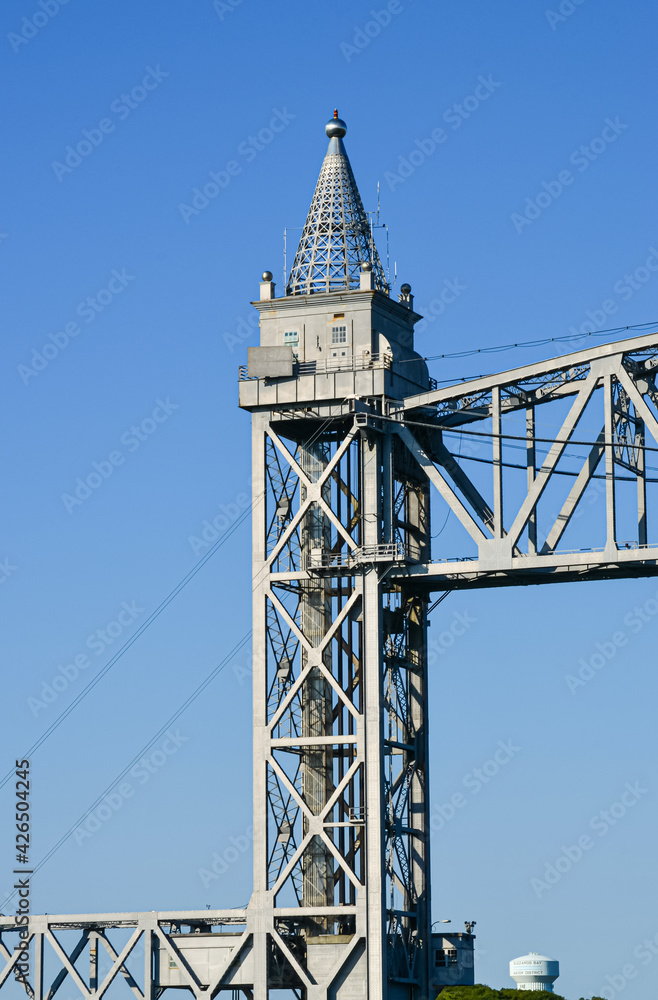 Obraz premium A tower of the Cape Cod Canal Railroad Bridge, a vertical lift bridge in Bourne, Massachusetts near Buzzards Bay. 