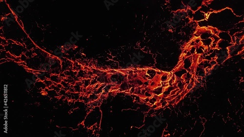 A closeup shot of burning red lava flowing in 4K photo