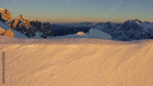 First-person view reaveal of Croda dei Toni e Cima d'Auronzo at dusk, Dolomiti di Sesto. Italy photo