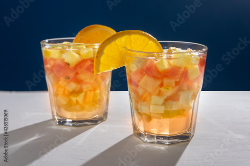 Sangria cocktail with white wine and fresh fruit