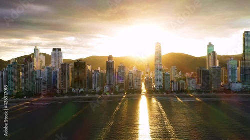 Aerial view of Balneário Camboriú cityscape during sunset, Brazil.