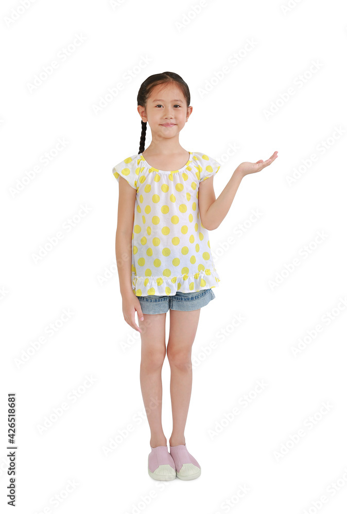 Asian Kid happy smiling face show something on open palm with copy space white background. Advertisement and Product presentation concept - Full length and clipping path Asian Kid happy smiling face show something on open palm with copy space white background. Advertisement and Product presentation concept - Full length and clipping path