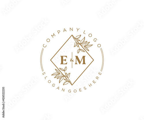 initial EM letters Beautiful floral feminine editable premade monoline logo suitable for spa salon skin hair beauty boutique and cosmetic company.