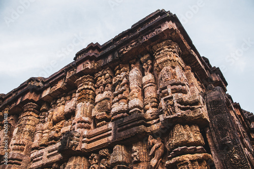 Low angle view of stone sculptures on the walls of Konark Sun Temple, India