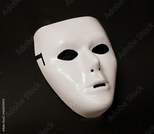 Theatrical mask set at an angle to give the viewer an impression of eye movement. © Neil