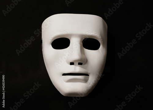 Theatrical mask set at an angle to give the viewer an impression of eye movement.