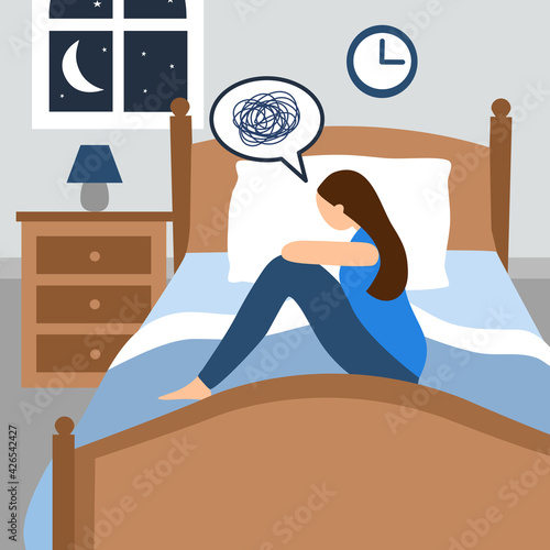 Depressed woman suffer from insomnia, sleeplessness sitting on bed in bedroom. Sleep disorder concept.