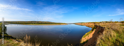 Panorama of the steep bank of the big Vyatka River flowing in the Udmurt Republic. Russia