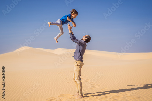 Father and son at the white desert. Traveling with children concept. Resumption of tourism after quarantine covid 19