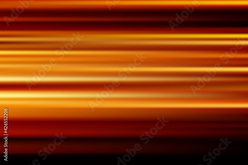 Speed orange light trails with motion blur of night lights.