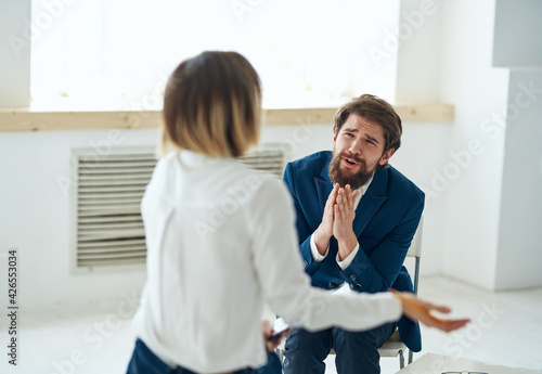 Woman psychologist talking with patient consultation diagnosis problem