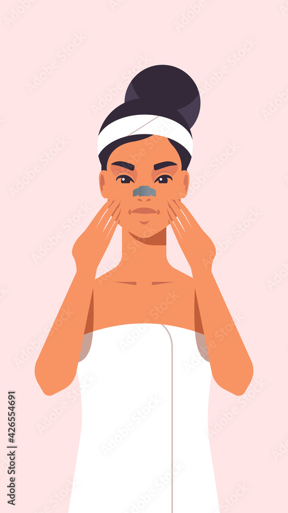 young woman applying skin cream dressed in towel girl cleaning and care her face skincare spa relax facial treatment concept portrait young woman applying skin cream dressed in towel girl cleaning and care her face skincare spa relax facial treatment concept portrait