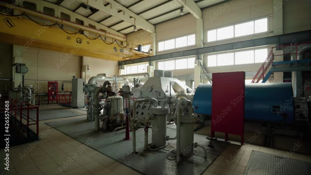 A huge oil refinery with metal structures, pipes and distillation of the complex. Industrial area with chemical plant. Process area structure , piping , engineering equipment A huge oil refinery with metal structures, pipes and distillation of the complex. Industrial area with chemical plant. Process area structure , piping , engineering equipment
