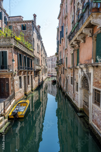 Small canal in the old town of Venice, Italy © elxeneize