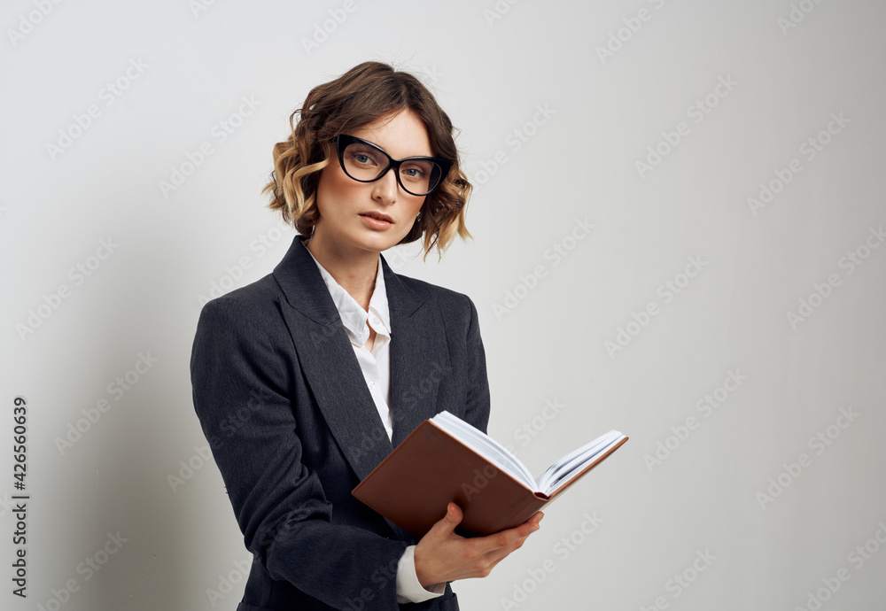 Woman in classic suit short haired glasses model business finance. Woman in classic suit short haired glasses model business finance.
