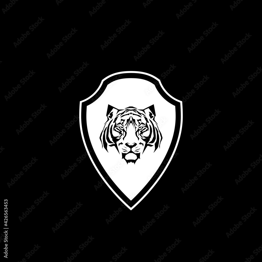 Tiger shield icon isolated on dark background Tiger shield icon isolated on dark background