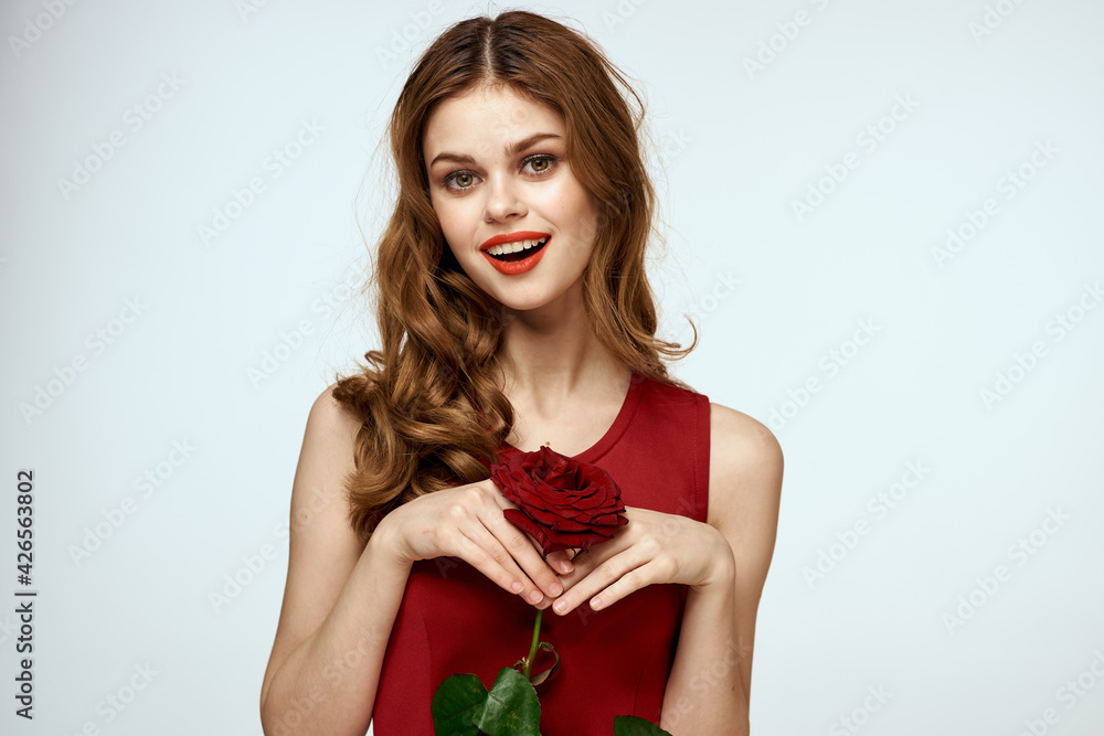 Elegant woman red dress rose in glamor cropped hands Elegant woman red dress rose in glamor cropped hands