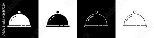 Set Covered with a tray of food icon isolated on black and white background. Tray and lid sign. Restaurant cloche with lid. Vector