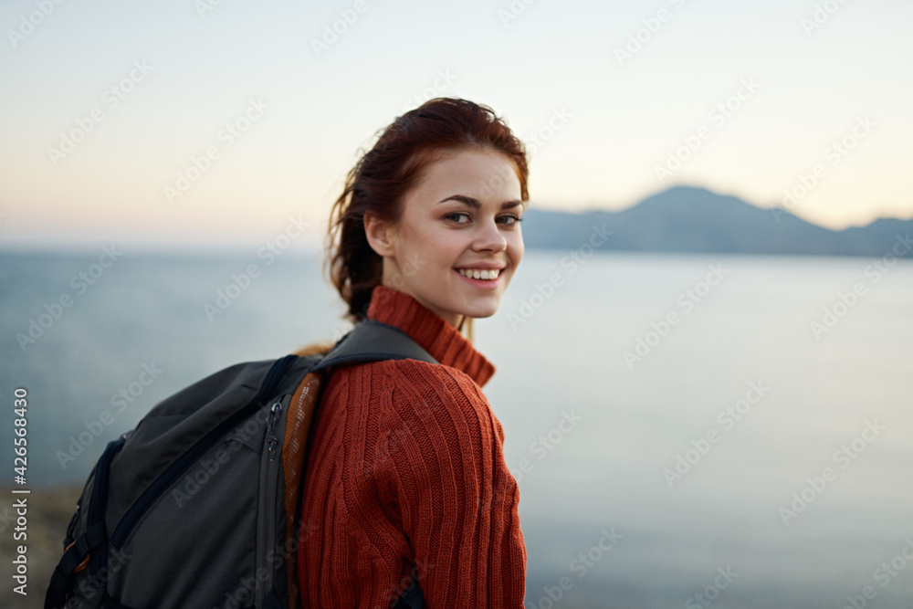 portrait woman travels in the mountains outdoors near the sea cropped view portrait woman travels in the mountains outdoors near the sea cropped view